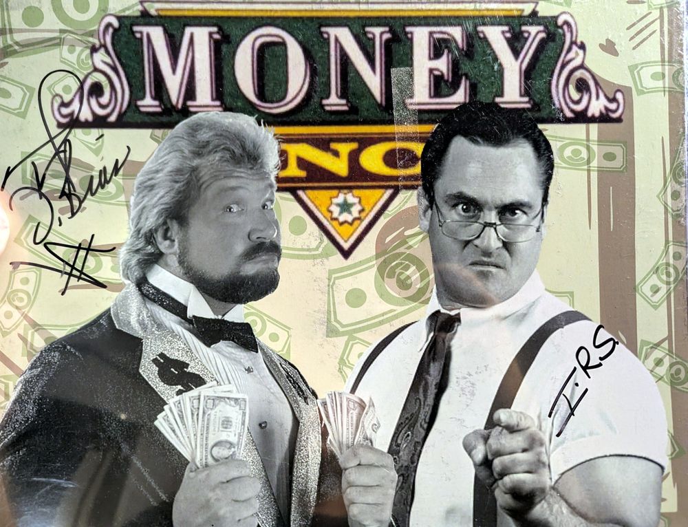 Money Inc. &mdash; Ted DiBiase & I.R.S. (Irwin R. Schyster) &mdash; signed 11&times;14 photo, signed by both